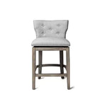 Sgabello da bar alto in tessuto Wingback