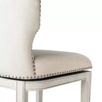 Sgabello da bar alto in tessuto Wingback