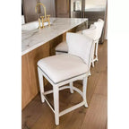 Sgabello da bar alto in tessuto Wingback