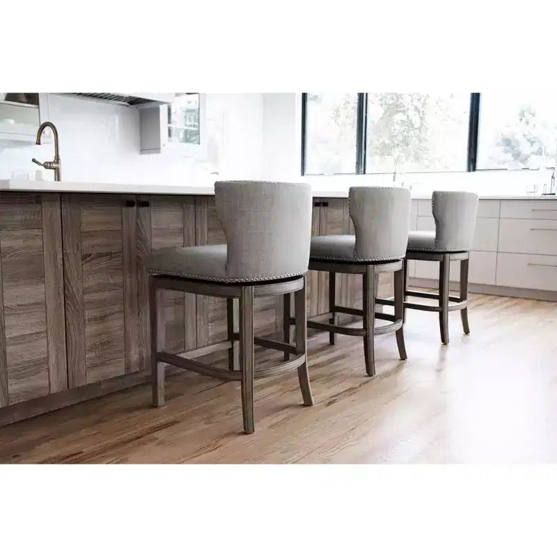 Sgabello da bar alto in tessuto Wingback