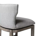 Sgabello da bar alto in tessuto Wingback