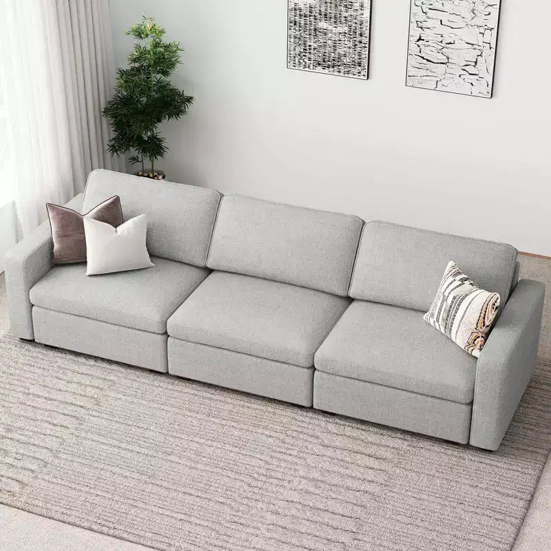 Divano componibile in ciniglia a 3 posti con pouf contenitore e seduta extra profonda