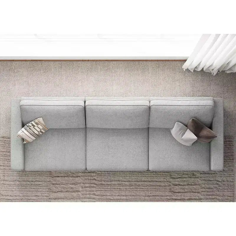 Divano componibile in ciniglia a 3 posti con pouf contenitore e seduta extra profonda