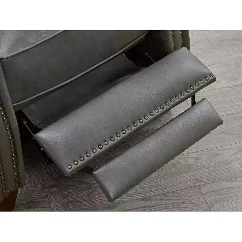 Poltrona reclinabile a spinta con borchie decorative per soggiorno