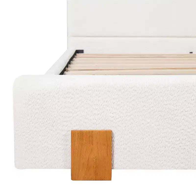 Letto con piattaforma imbottito in boucle moderno con testiera