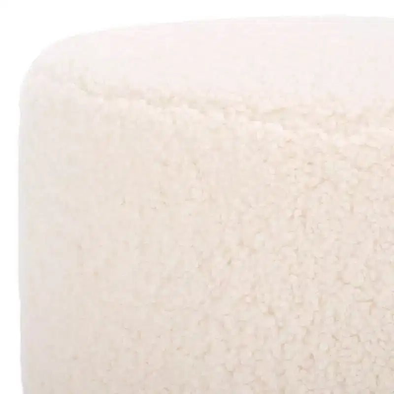 Pouf rotondo in finto montone con base in legno di caucciù
