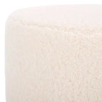Pouf rotondo in finto montone con base in legno di caucciù